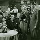Ronald Reagan, Peggy Knudsen, Zachary Scott, and Alexis Smith in Stallion Road (1947)
