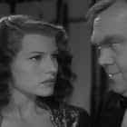 Rita Hayworth and Thomas Mitchell in Tales of Manhattan (1942)