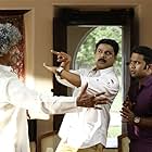 Makrand Deshpande, Dileep, and Aju Varghese in Two Countries (2015)