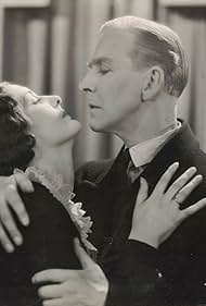 Anne Grey and Percy Marmont in The Squeaker (1930)