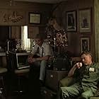 Harrison Ford, Martin Sheen, G.D. Spradlin, and Jerry Ziesmer in Apocalypse Now (1979)
