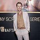 Glen Powell at an event for Hit Man (2023)