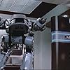 Ronny Cox and Jon Davison in RoboCop (1987)