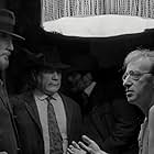 Woody Allen, David Ogden Stiers, Victor Argo, James Rebhorn, and Daniel von Bargen in Shadows and Fog (1991)