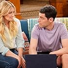 Max Greenfield and Beth Behrs in Welcome to the Other Neighborhood (2023)