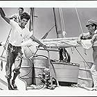 Victor Mature, Claude Akins, and Rafael Campos in The Sharkfighters (1956)