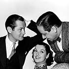 Robert Benchley, Robert Montgomery, and Rosalind Russell in Live, Love and Learn (1937)
