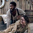 Corey Hawkins and Aisling Franciosi in The Last Voyage of the Demeter (2023)