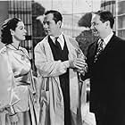 Robert Benchley, Robert Montgomery, and Rosalind Russell in Live, Love and Learn (1937)