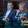 Chris Elliott and Eugene Levy in Schitt$ Creek (2015)