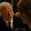 Michael Caine and Aaron Eckhart in The Dark Knight (2008)