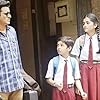 Manoj Bajpayee, Ashlesha Thakur, and Vedant Sinha in The Family Man (2019)
