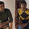 Chandan Roy and Jitendra Kumar in Panchayat (2020)