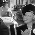 Glenda Farrell and John Ridgely in Blondes at Work (1938)