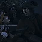 Luke Evans and Benjamin Evan Ainsworth in Pinocchio (2022)
