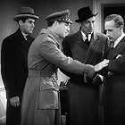 Leslie Howard, Cesar Romero, William Gargan, and Phillip Reed in British Agent (1934)