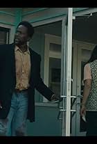 Harold Perrineau and Elizabeth Moy in Broken Windows, Open Doors (2022)