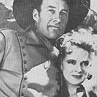 Dorothy Comingore and Bill Elliott in Pioneers of the Frontier (1940)