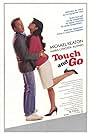 Michael Keaton and Maria Conchita Alonso in Touch and Go (1986)