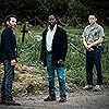 Eion Bailey, Harold Perrineau, Kenny Liu, and Ricky He in From (2022)