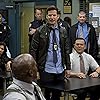 Terry Crews, Joe Lo Truglio, Joel McKinnon Miller, Andy Samberg, and Stephanie Beatriz in Brooklyn Nine-Nine (2013)