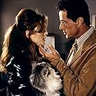 Julianne Moore and Sylvester Stallone in Assassins (1995)