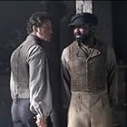 David Oyelowo and Dominic West in Les Misérables (2018)