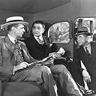 Edward G. Robinson, Thomas E. Jackson, and Raymond Massey in The Woman in the Window (1944)