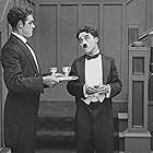 Charles Chaplin and Albert Austin in The Adventurer (1917)