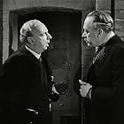 Miles Malleson and Clive Morton in Kind Hearts and Coronets (1949)