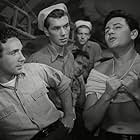John Garfield, Dane Clark, Robert Hutton, and Paul Langton in Destination Tokyo (1943)