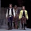 Harrison Ford, Mark Hamill, Peter Mayhew, and Derek Lyons in Star Wars (1977)
