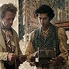 Hugh Laurie and Dev Patel in The Personal History of David Copperfield (2019)