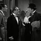 Herbert Marshall, Frank Morgan, Reginald Owen, and Margaret Sullavan in The Good Fairy (1935)