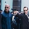Keanu Reeves, Laurence Fishburne, and Hugo Weaving in The Matrix (1999)