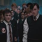 Alfred Enoch, Rupert Grint, Matthew Lewis, Daniel Radcliffe, Emma Watson, Bonnie Wright, James Phelps, Oliver Phelps, Afshan Azad, and Shefali Chowdhury in Harry Potter and the Order of the Phoenix (2007)