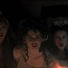 Monica Bellucci, Michaela Bercu, and Florina Kendrick in Bram Stoker's Dracula (1992)
