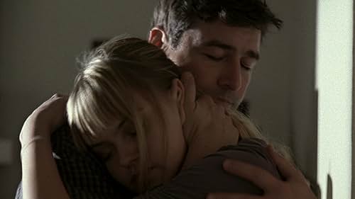 Kyle Chandler and Aimee Teegarden in Friday Night Lights (2006)