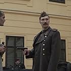 Jonah Hauer-King and Andrei Nova in The Tattooist of Auschwitz (2024)