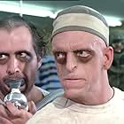 Michael Berryman and Wallace Merck in Voyage of the Rock Aliens (1984)