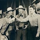 Spade Cooley, Carole Mathews, Dub Taylor, and Philip Van Zandt in Outlaws of the Rockies (1945)