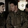 Damian Lewis, Ron Livingston, and Stephen McCole in Band of Brothers (2001)