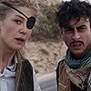 Rosamund Pike and Fady Elsayed in A Private War (2018)
