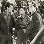 Glenn Ford, Richard Conte, and Jean Rogers in Heaven with a Barbed Wire Fence (1939)