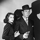 Rita Hayworth and Bruce Cabot in Homicide Bureau (1939)
