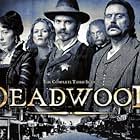 Brad Dourif, Powers Boothe, Paula Malcomson, Ian McShane, Timothy Olyphant, Molly Parker, and Robin Weigert in Deadwood (2004)