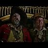 Angus Barnett and Giles New in Pirates of the Caribbean: Dead Men Tell No Tales (2017)