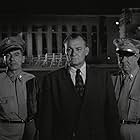 Robert Burton, Emile Meyer, and Carleton Young in Riot in Cell Block 11 (1954)