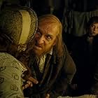 Ben Kingsley, Jamie Foreman, Leanne Rowe, and Lewis Chase in Oliver Twist (2005)