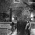 Gene Kelly and Brick Sullivan in Singin' in the Rain (1952)